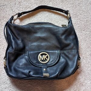 Michael Kors Black Hobo Bag with Gold Accents